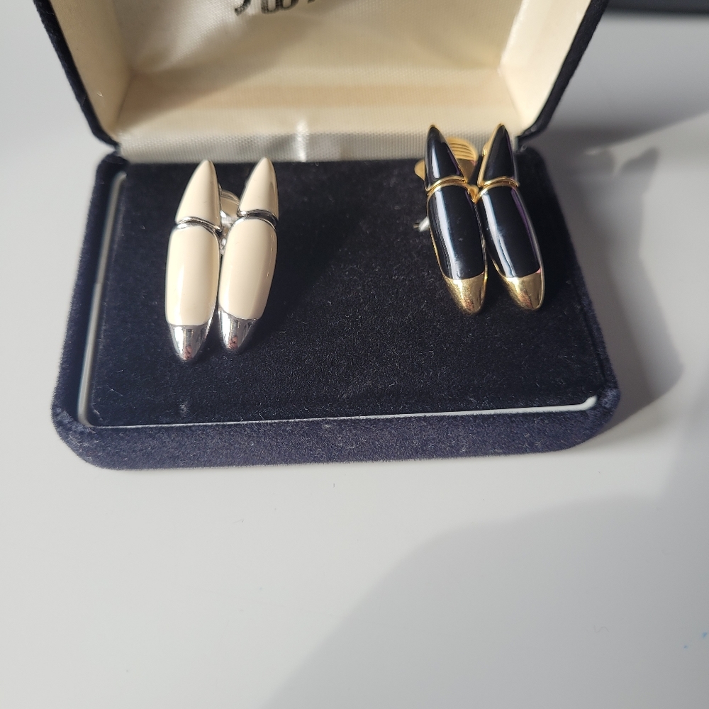 Set of 2 vintage black and gold white and silver Monet clip-on earrings